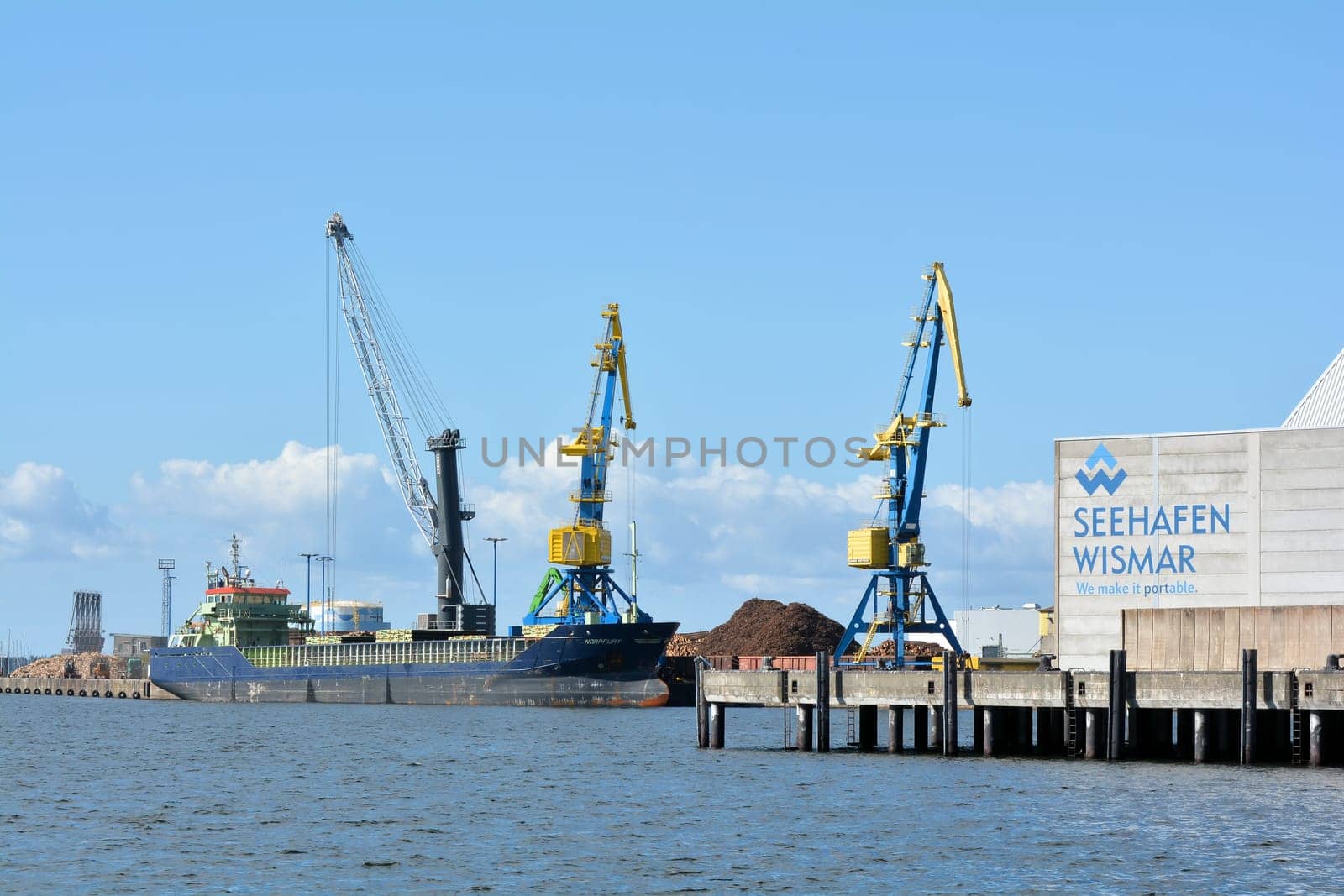 Cranes in the port of the old town of Wismar on the Baltic Sea