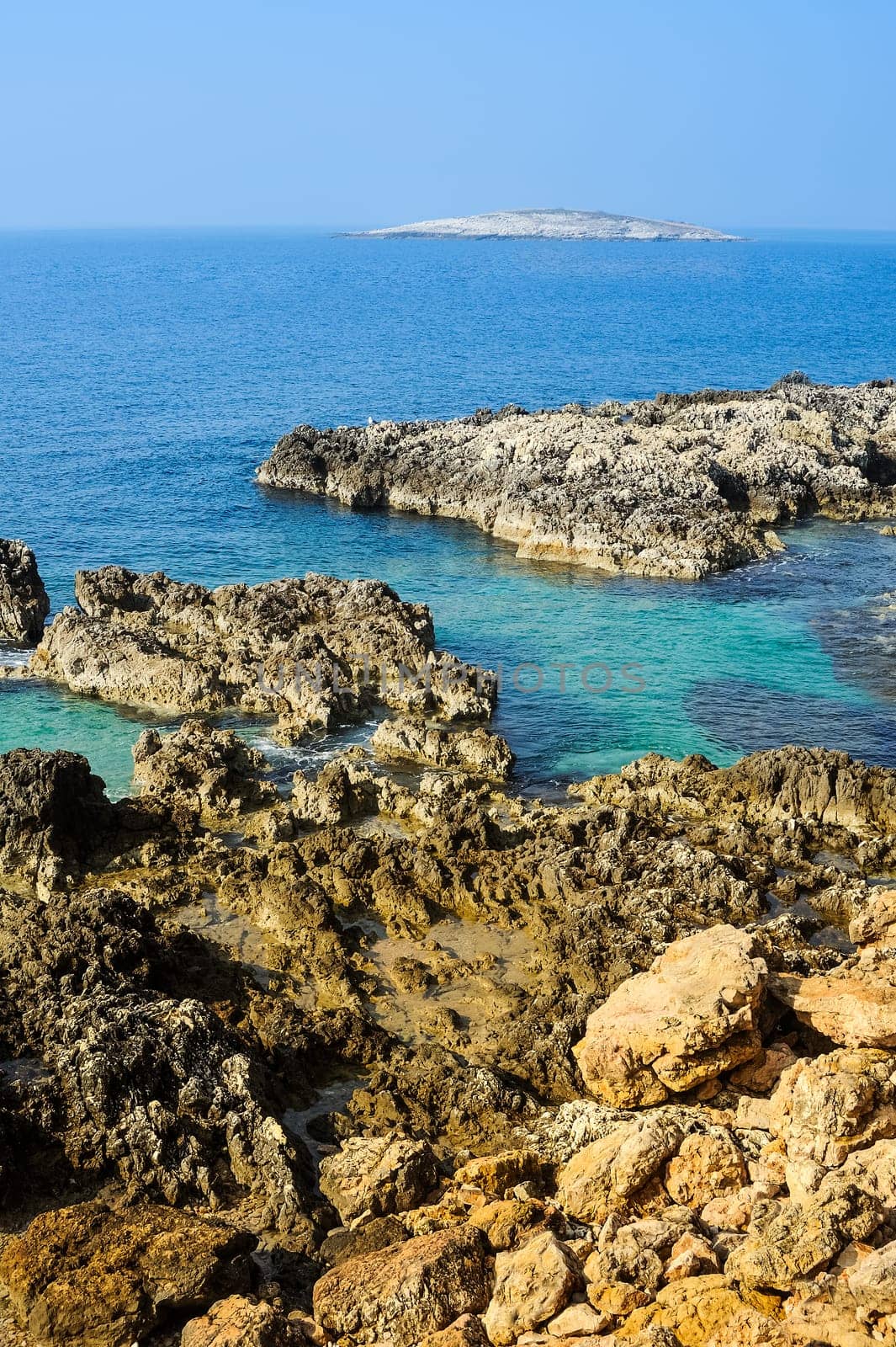 Rocky coast in N Istria with small island