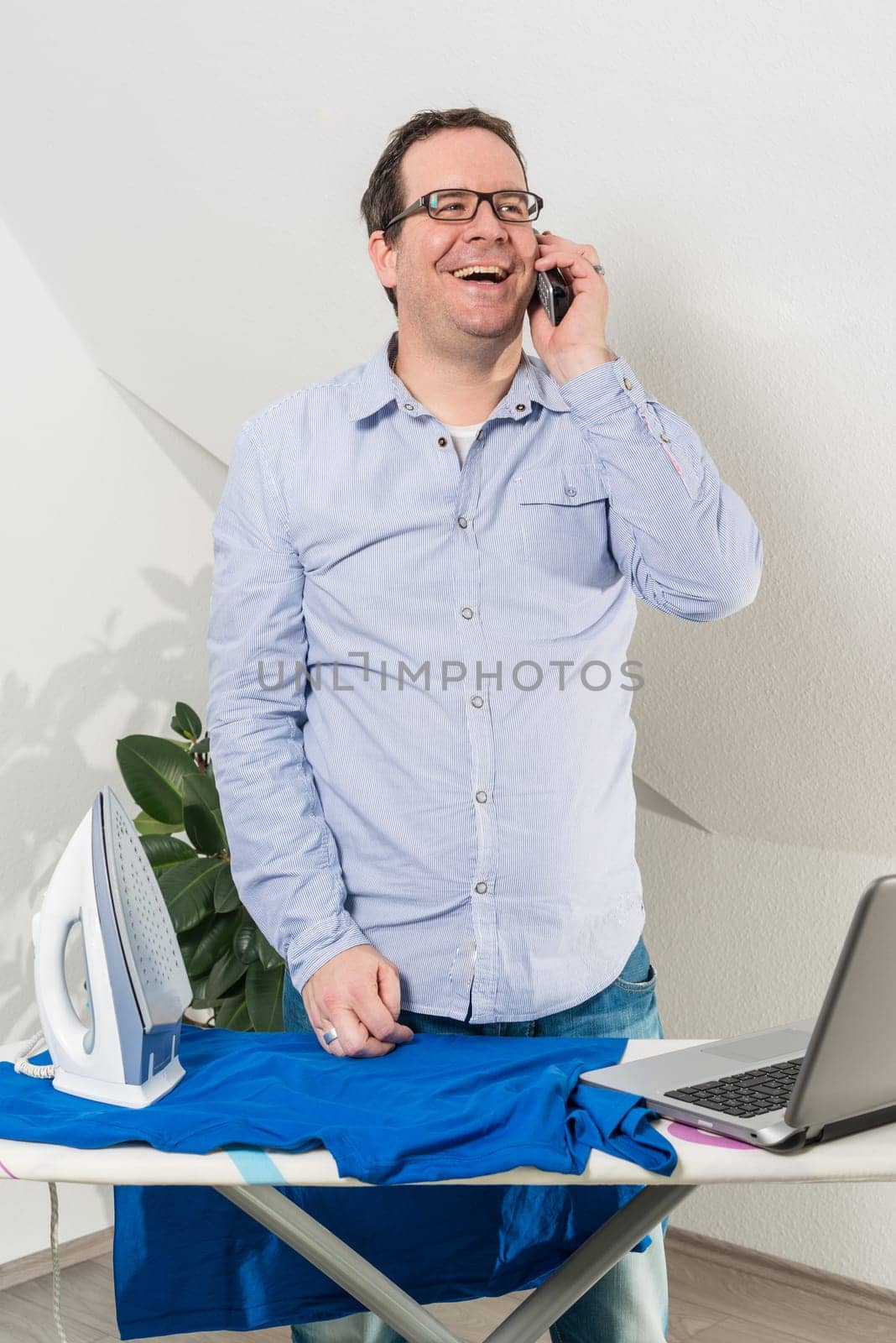 Business man balance his work and life while home work