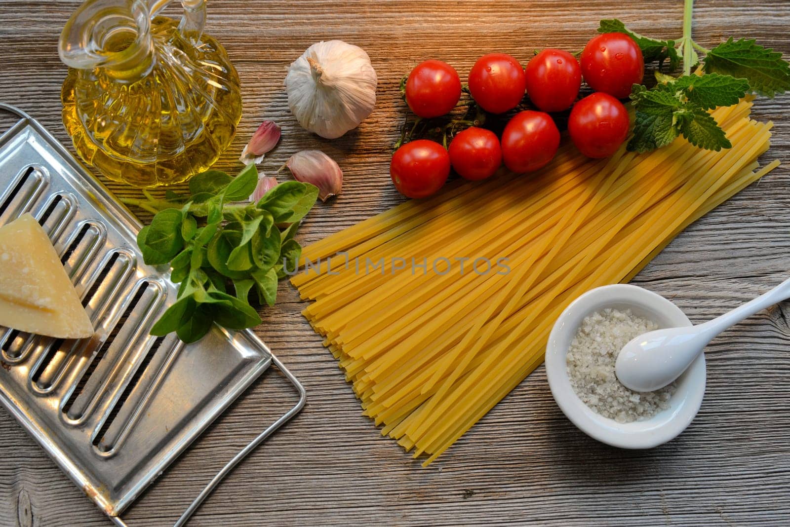 Pasta Tomatoes Parmesan on wood background