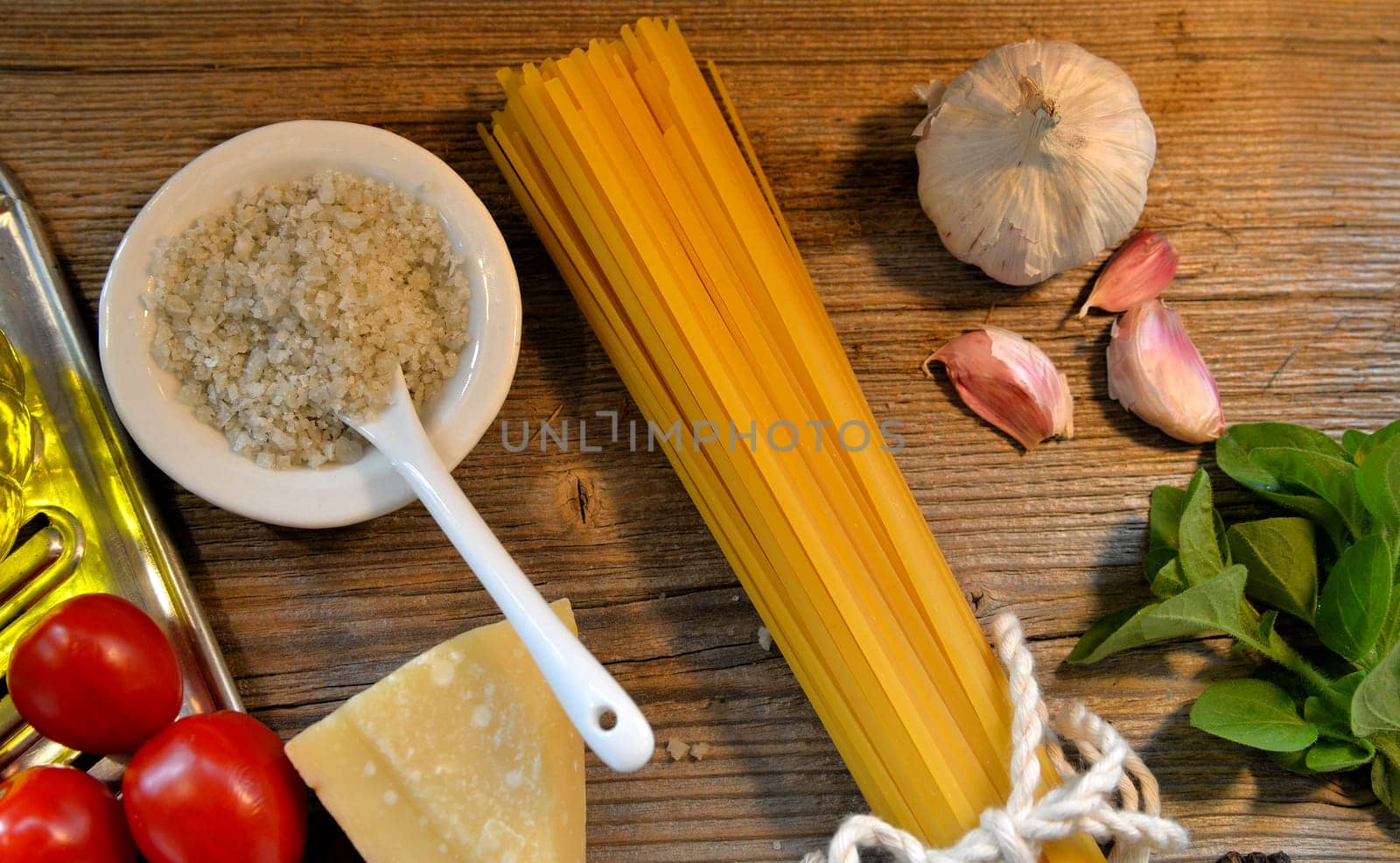 Pasta Tomatoes Parmesan on wood background