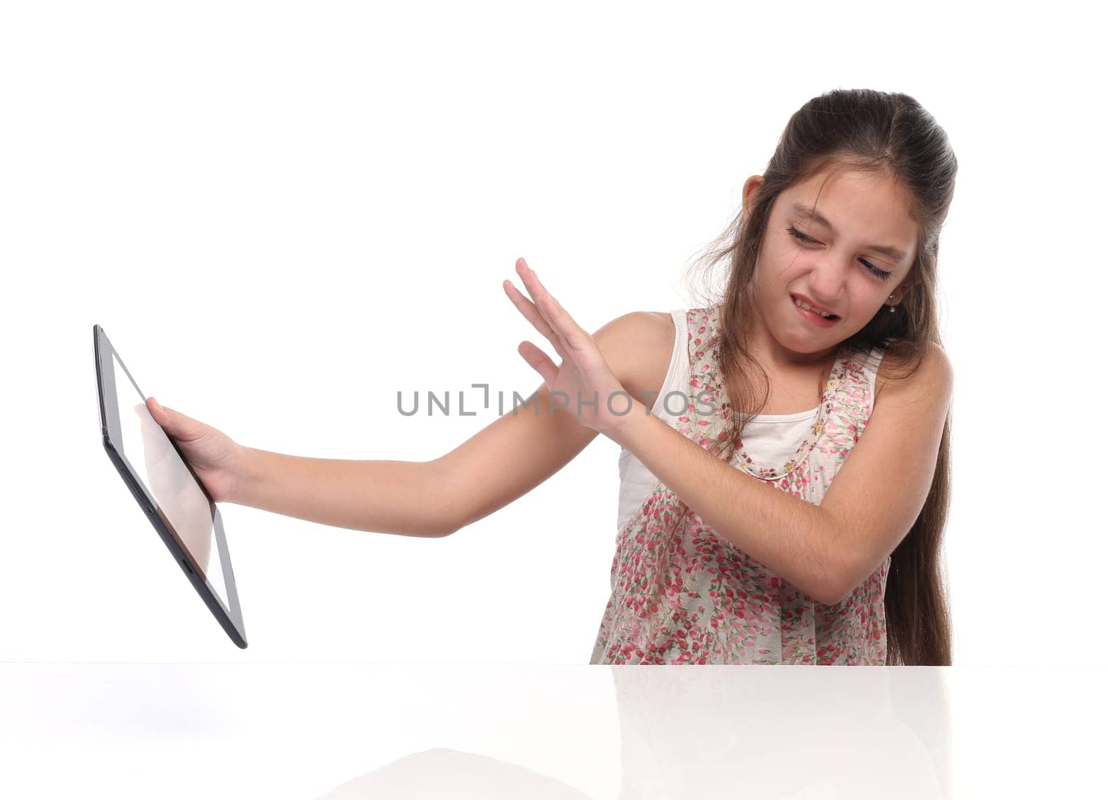 I don´t want to see that! Parental Control. Pre-teen girl with a tablet pc