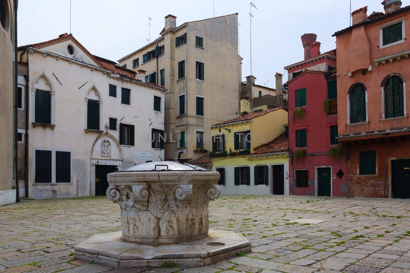A view from Venice, little square with colorful houses, Italy