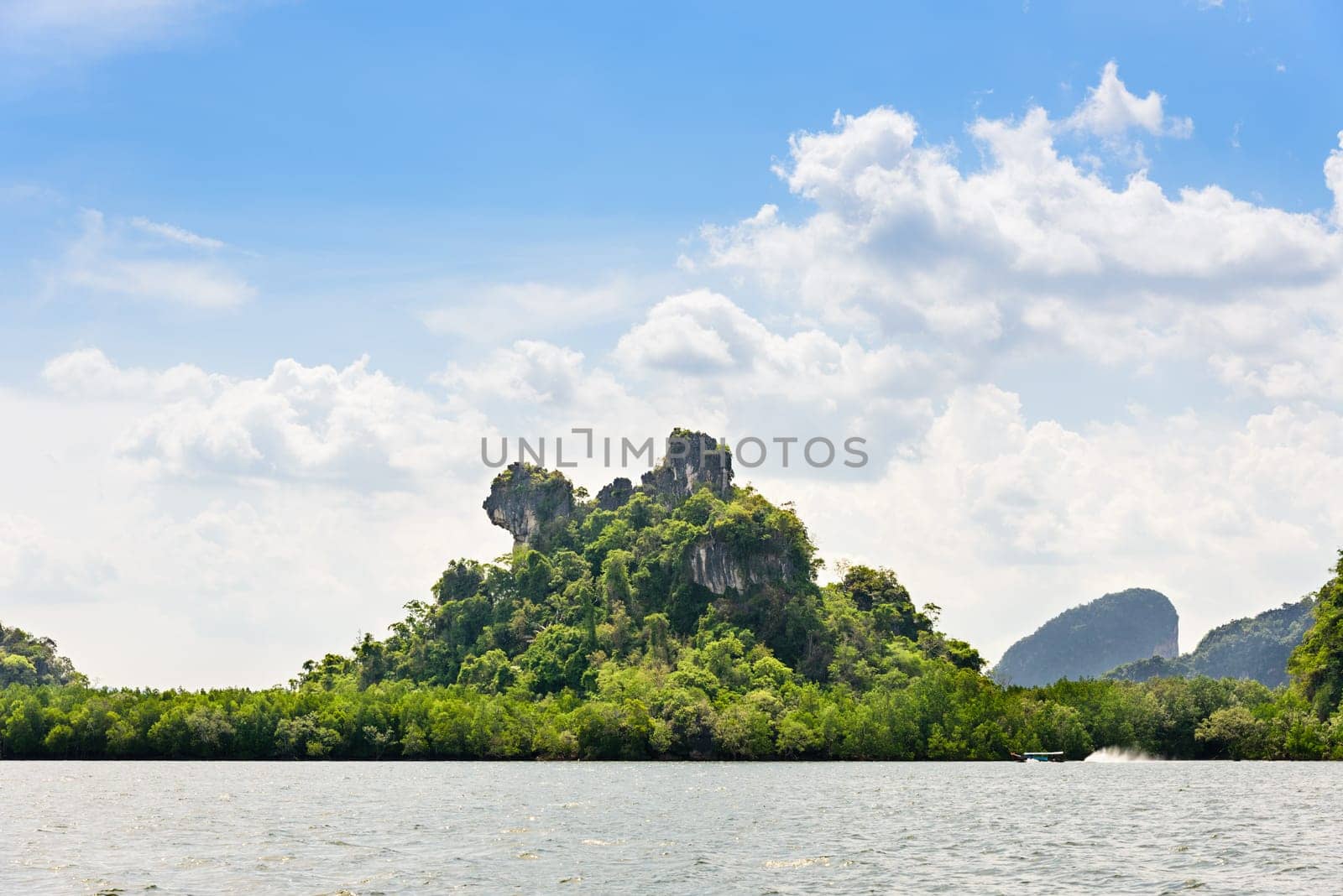 Khao Ma Chu island is scenic natural during a trip at the sea by a boat in Phang Nga Bay or Ao Phang Nga National Park, Thailand