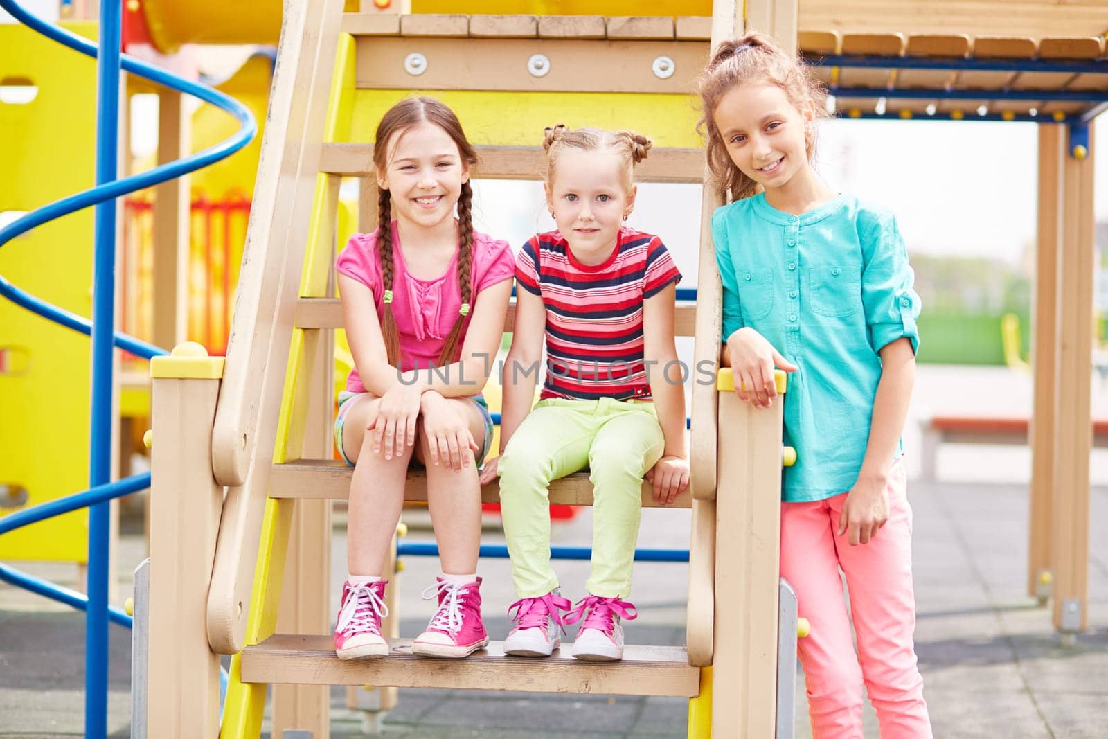 Active girls having fun on playground