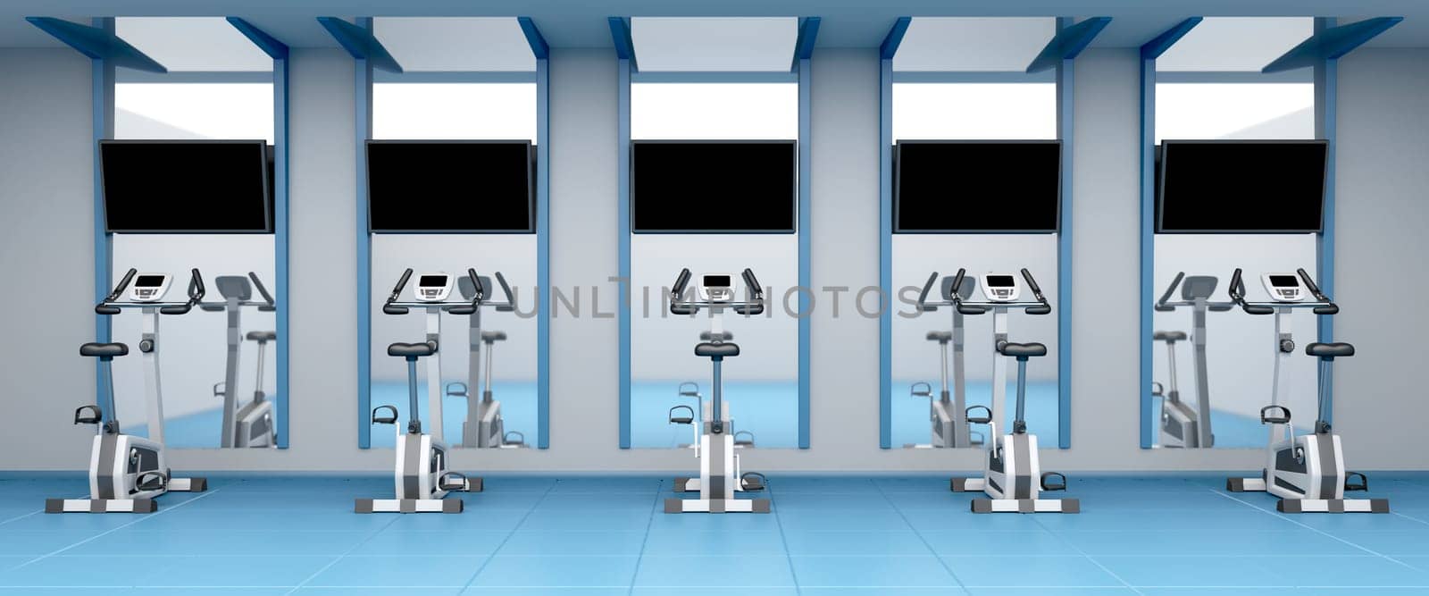 Exercise bikes in a row at fitness center