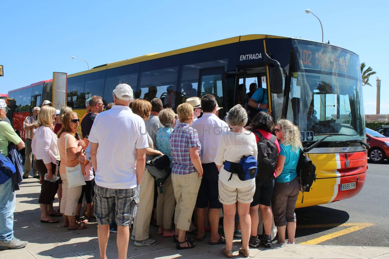 Tourists are waiting for the bus in Mallorca. Palma de Mallorca Island Sight Landscape Water Sea Hiking Hiking Church Port Spain Holiday Island