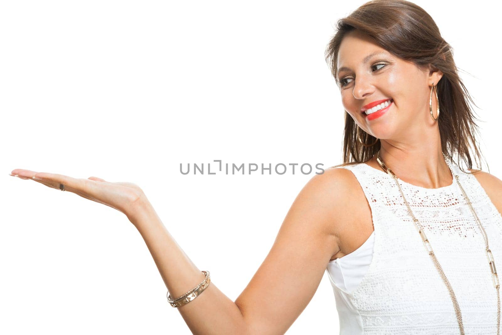 Young pretty woman with open posture joyfully laughing isolated against white background