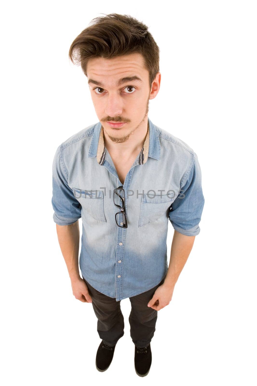 young casual man full body in a white background