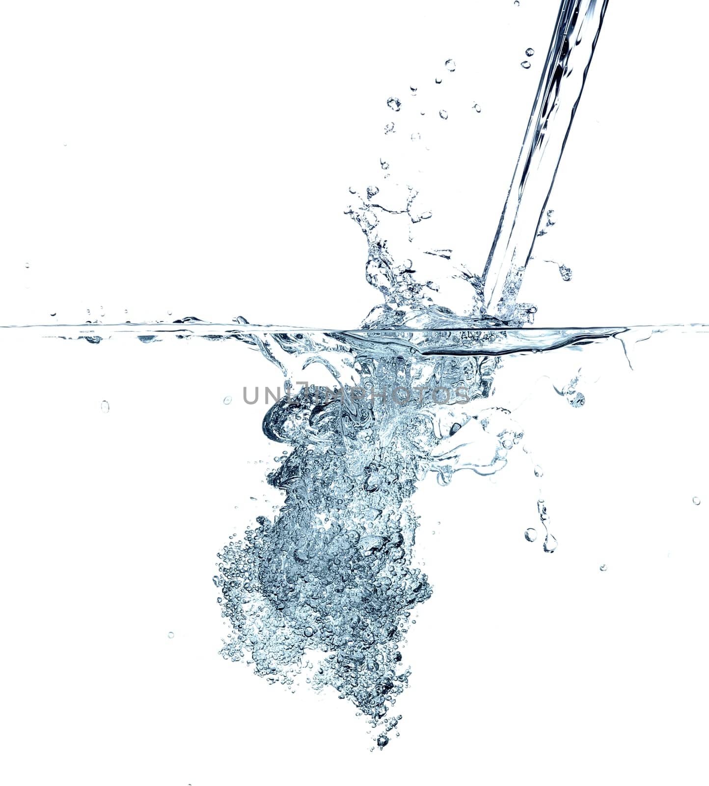 Water making bubbles upon being poured into more water, isolated on white background