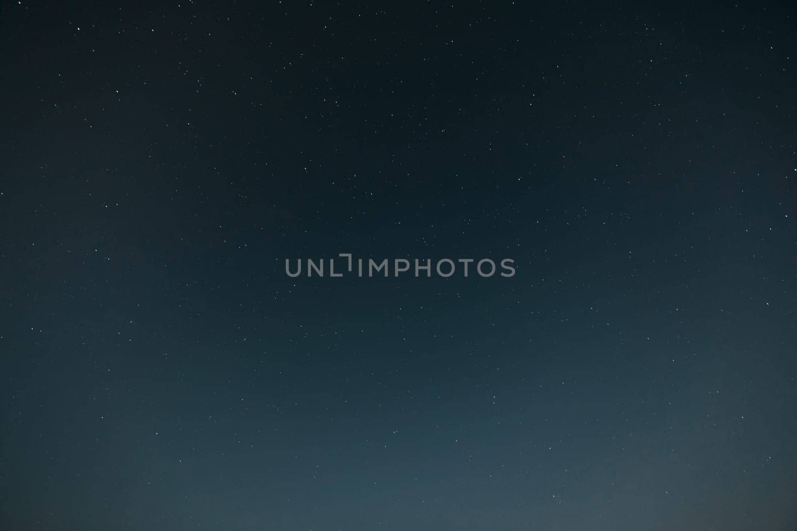 Real Night Sky Stars. Natural Starry Sky Blue Color Background.
