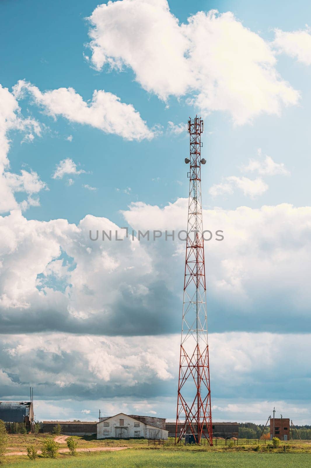 Telecommunications Cell Phone Tower With Antenna In Countryside. Belarus.