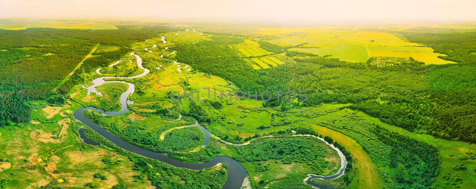 Aerial View Of Summer Curved River Landscape In Sunny Summer Day. Top View Of Beautiful European Nature From High Attitude In Summer Season. Drone View. Bird's Eye View