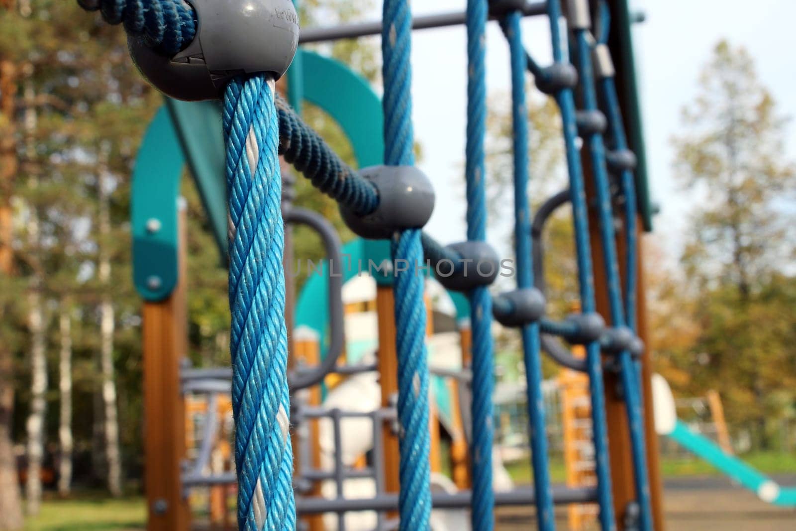 Children's playground with sports equipment in the city park. The concept of a healthy lifestyle.