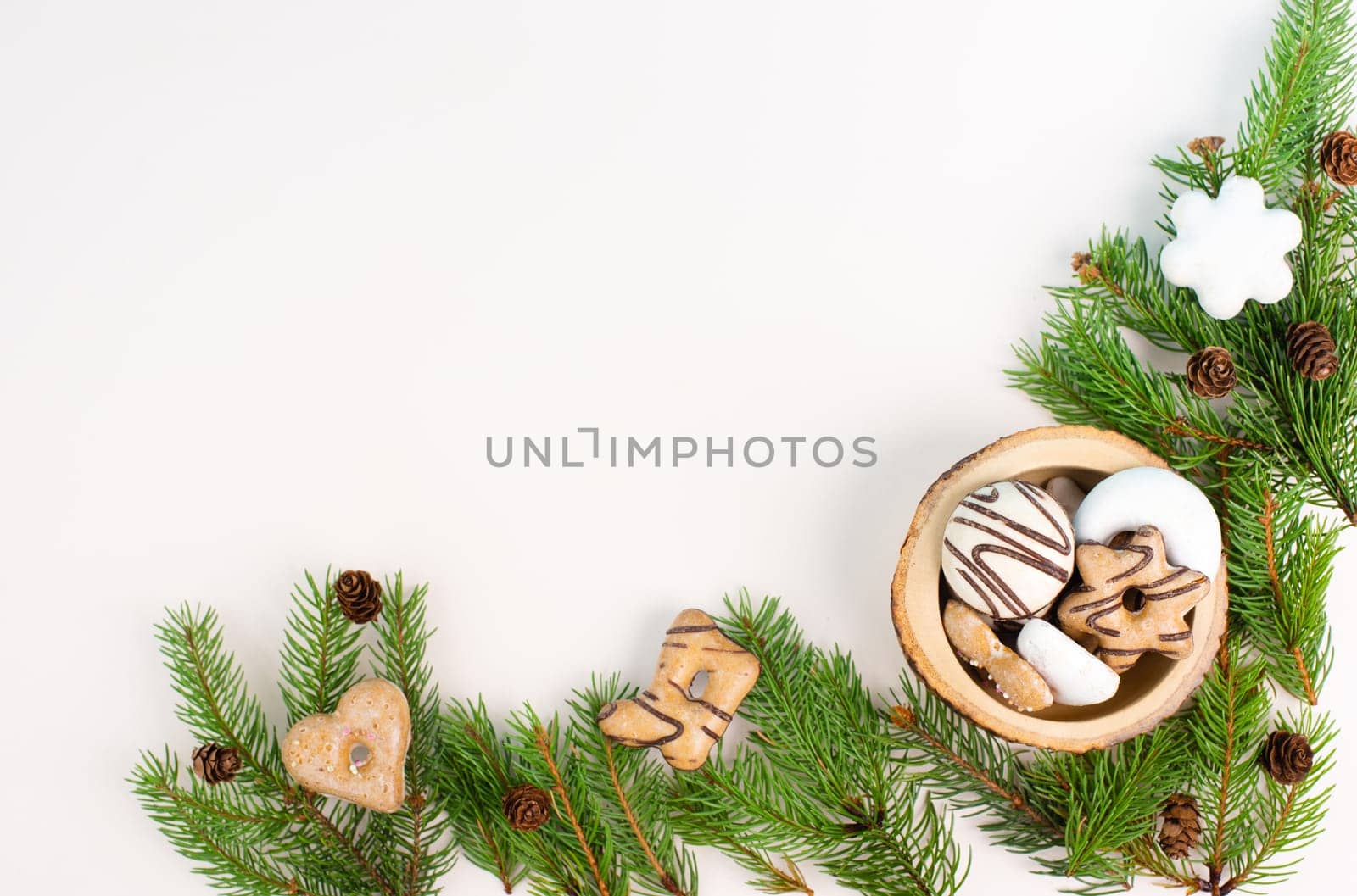 Nurnberg elisen gingerbread mix, traditional german christmas sweets with fir branches and pine cones, holiday background with copy space