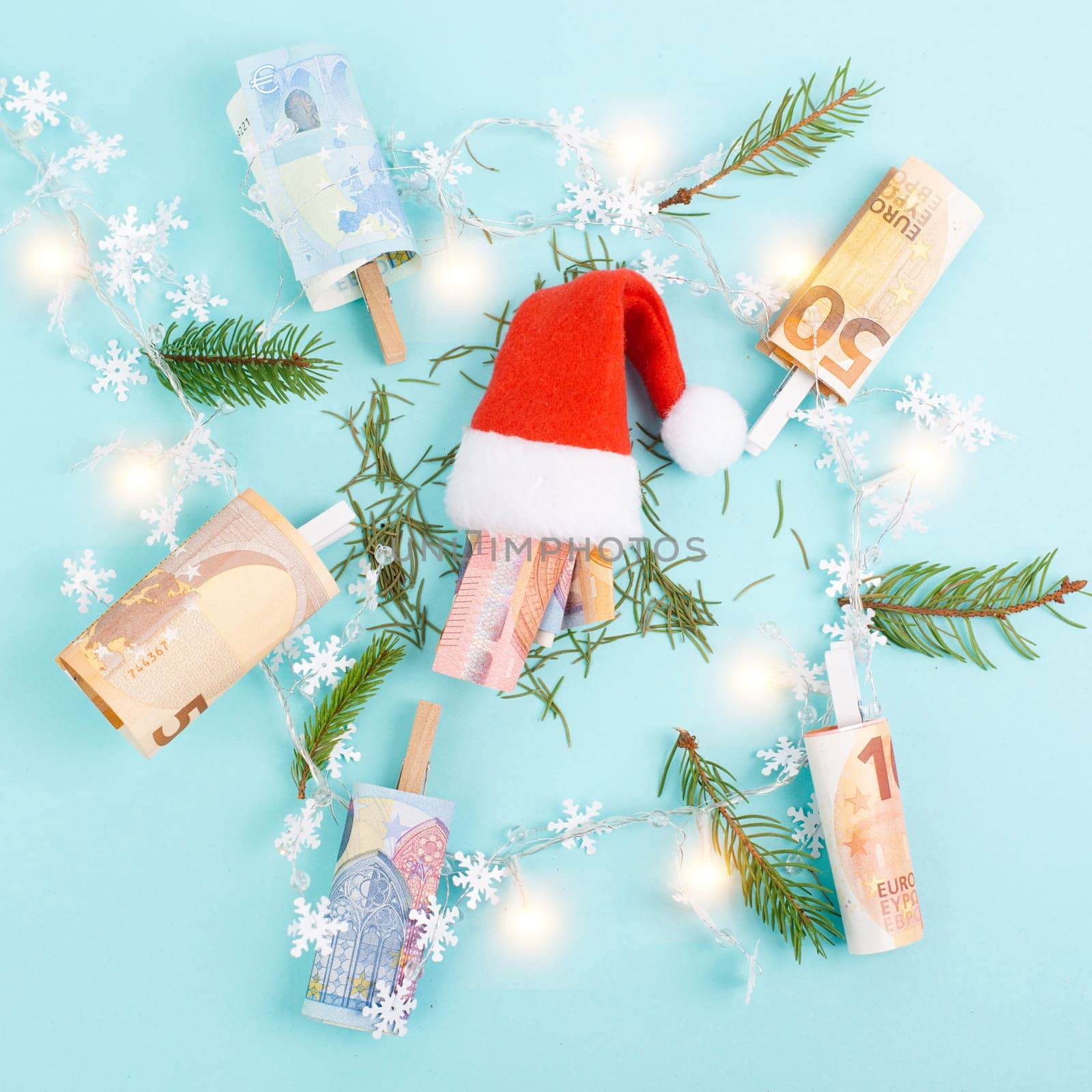 Christmas fairy lights with money, increase of electricity costs, save energy at the holiday season