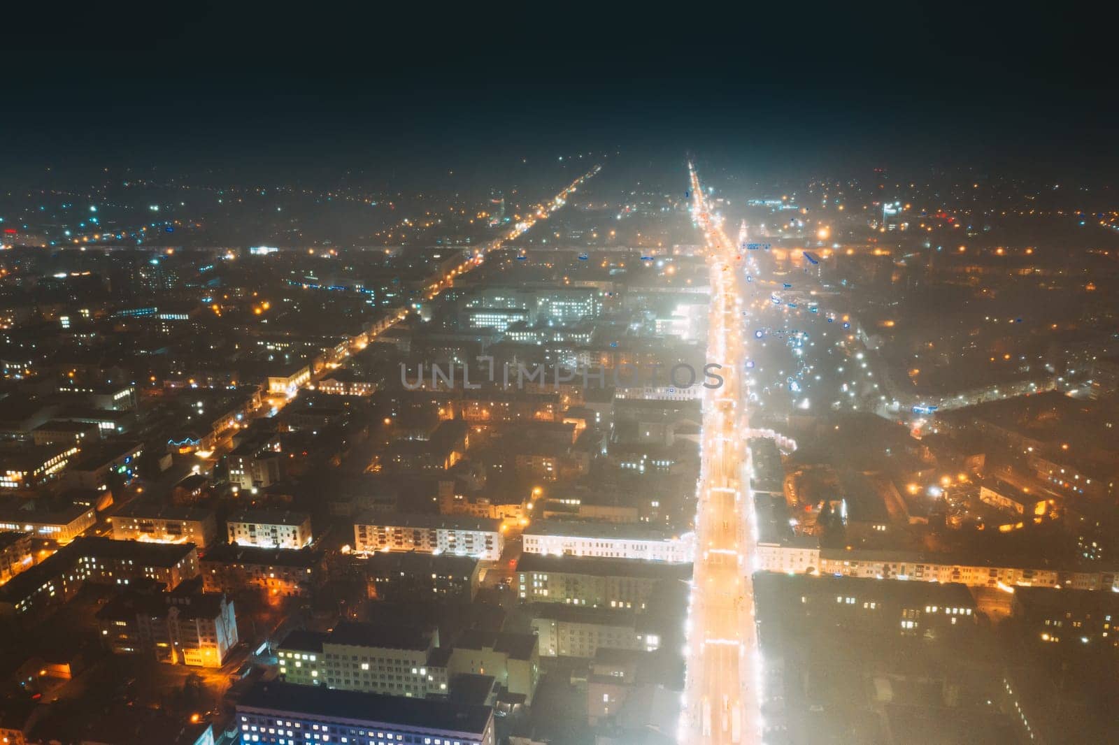 Gomel, Belarus. Main Street In Night Illumination. Sovetskaya Street In Homel. Aerial Night View.