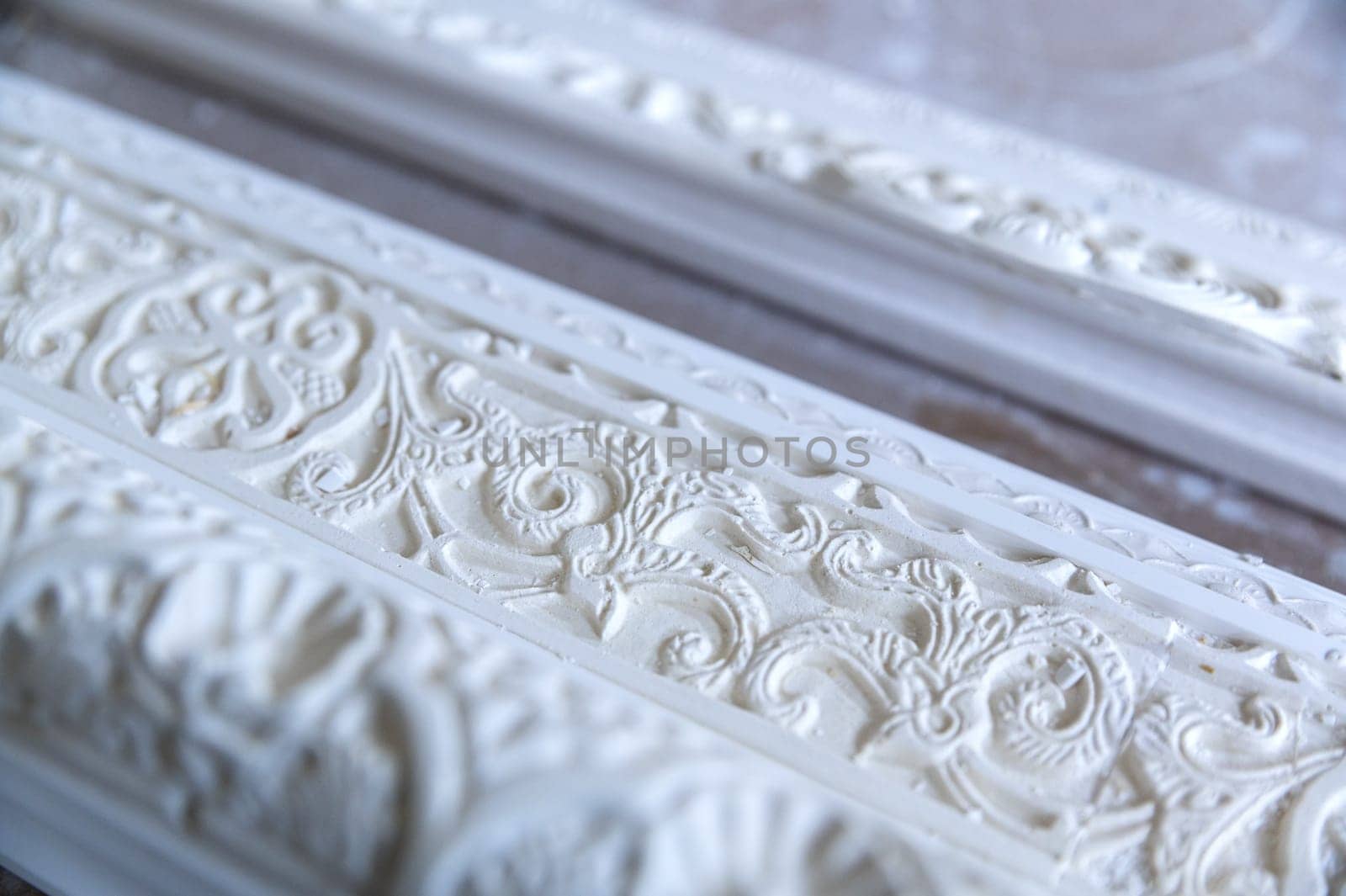 detail of the work of a supplier of frames, plaster sculptor