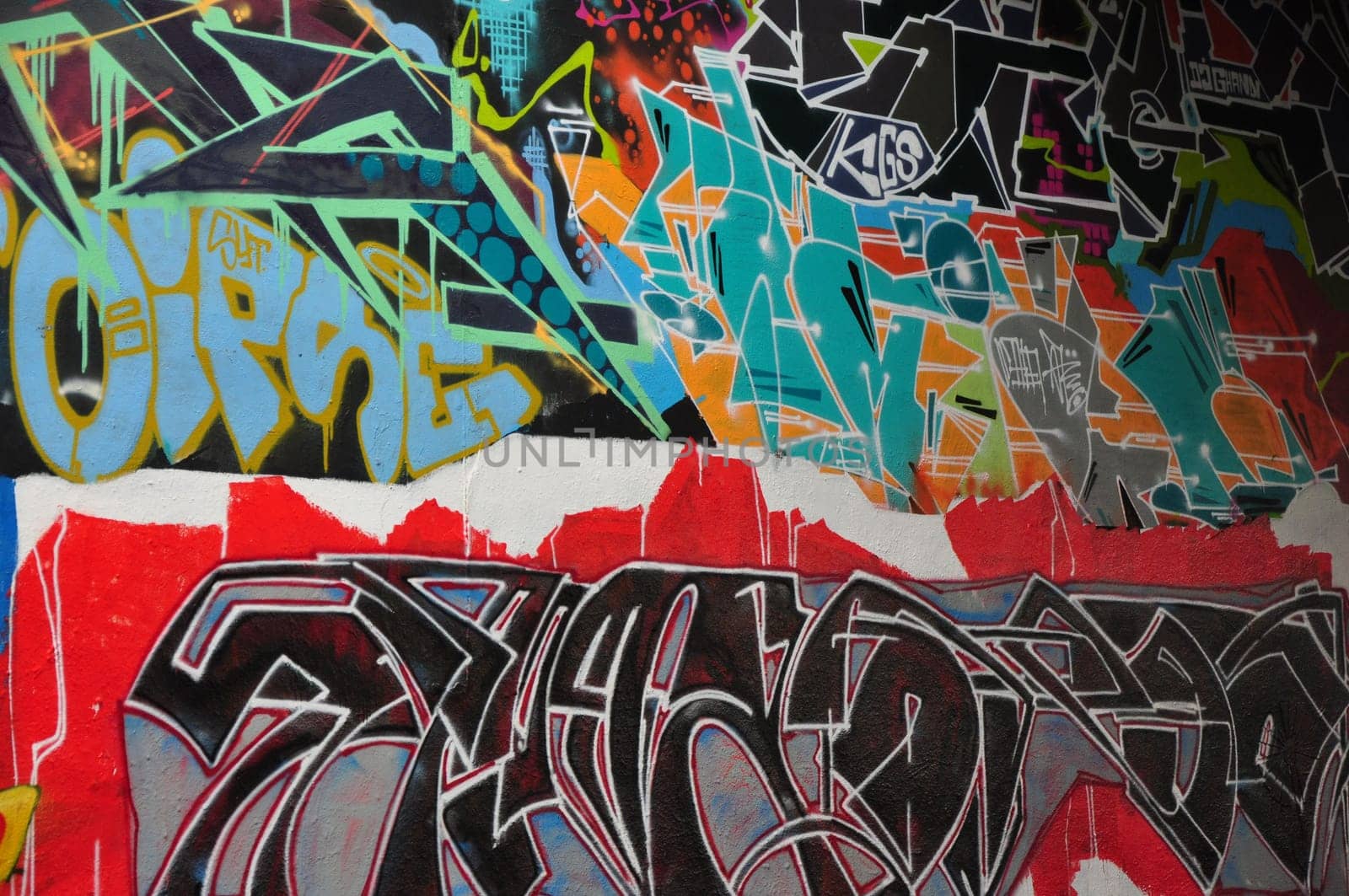 Vertical closeup of a colorful legal public graffiti wall on Tesnov Street in Prague, Czech Republic