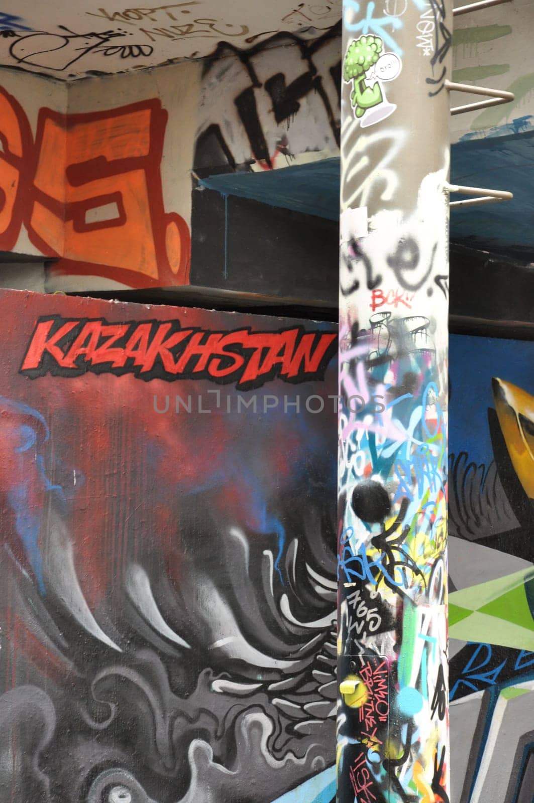 Vertical closeup shot of a legal public graffiti wall on Tesnov Street in Prague, Czech Republic