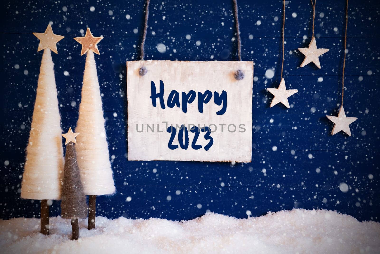 Christmas Decoration Like White Tree With Star On Blue Background. White Snow On Ground With Snowflakes. Sign With English Calligraphy Happy 2023