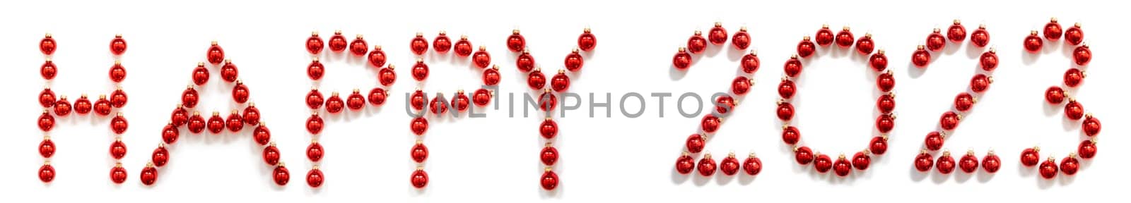 Red Christmas Ball Ornament Building English Word Happy 2023. Festive Christmas Decoration. White Isolated Background