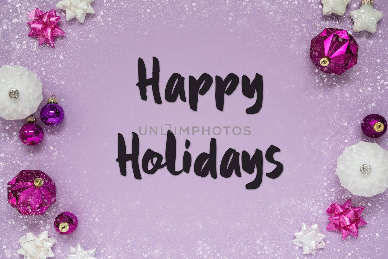 Christmas Card With English Text Happy Holidays. Purple Christmas Background With Romantic And Brilliant Decoration Like Balls And Snowflakes