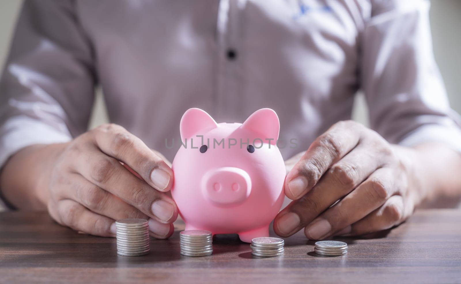 Save money and account banking for finance concept, Piggy bank with coin on blurred background, Save Monney for Investors Using Internet to Trade Stocks or Trade Fund