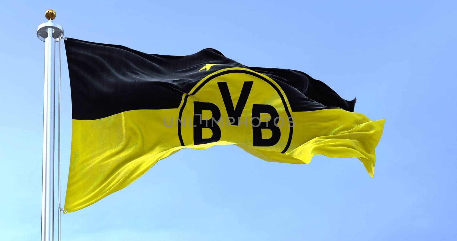 Dortmund, GER, September 2022: The flag of Borussia Dortmund waving in the wind. Borussia Dortmund is a German professional sports club based in Dortmund.
