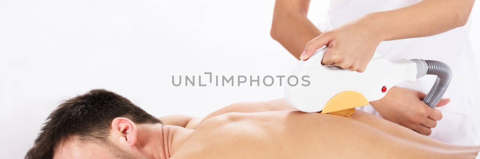 Hair Removal Cosmetology Procedure From A Therapist At Cosmetic Beauty Spa Clinic