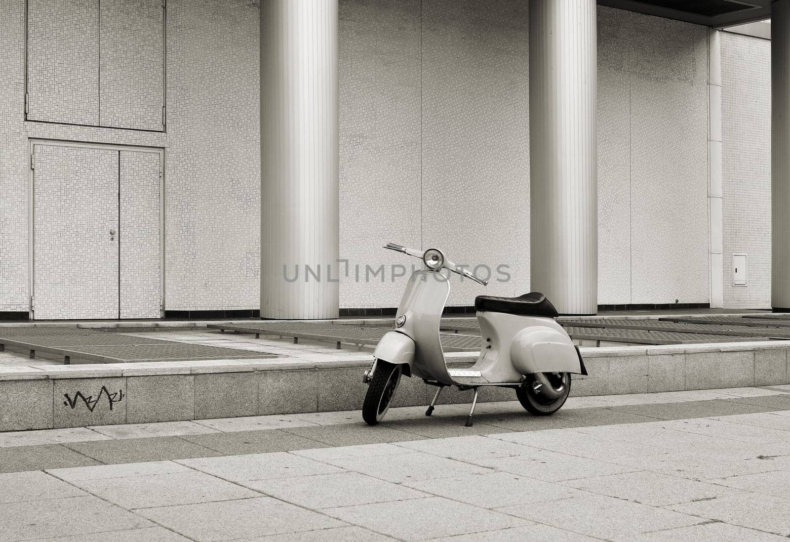 parked scooter on the roadside in the centre of Berlin