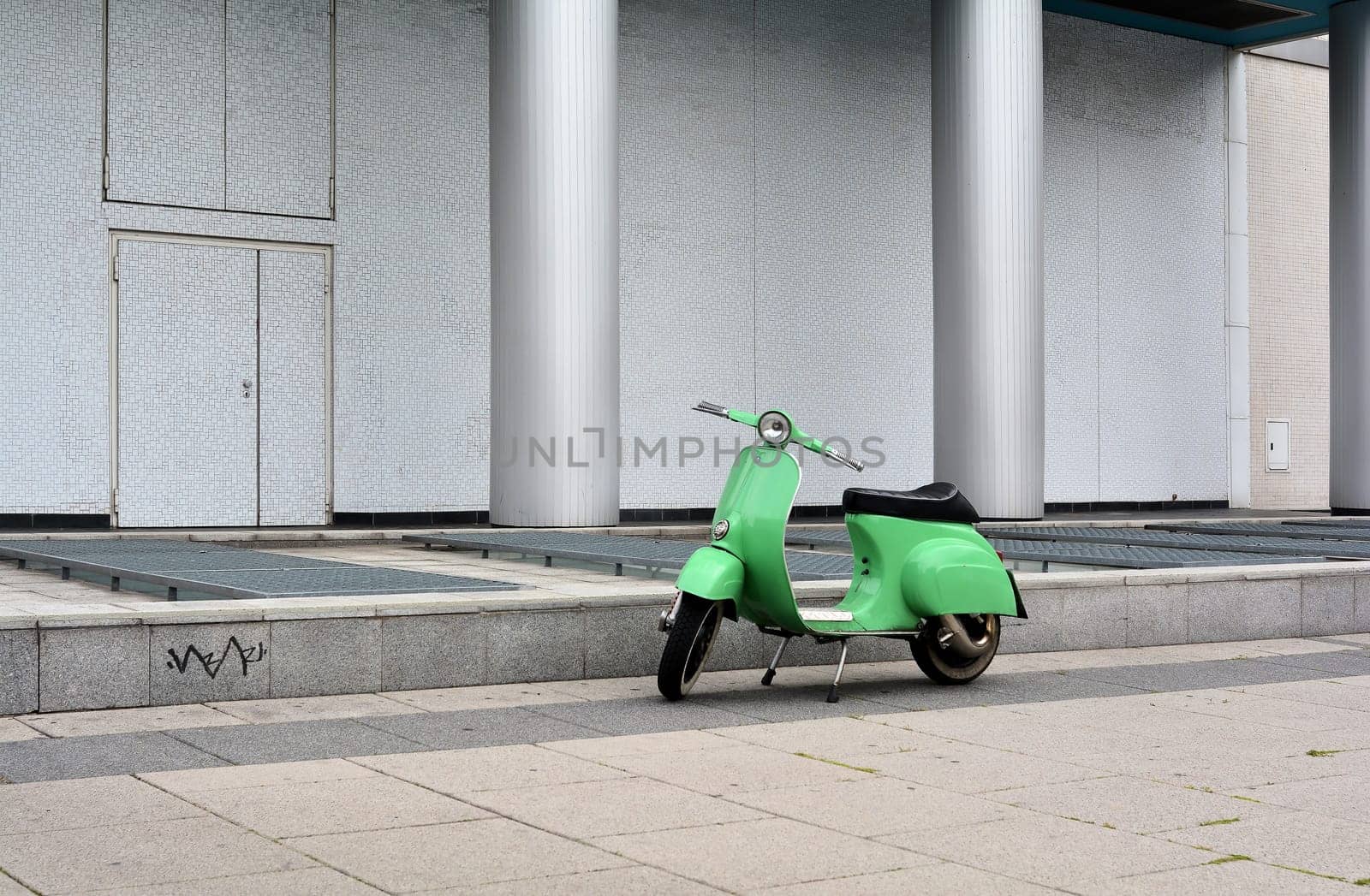 parked scooter on the roadside in the centre of Berlin
