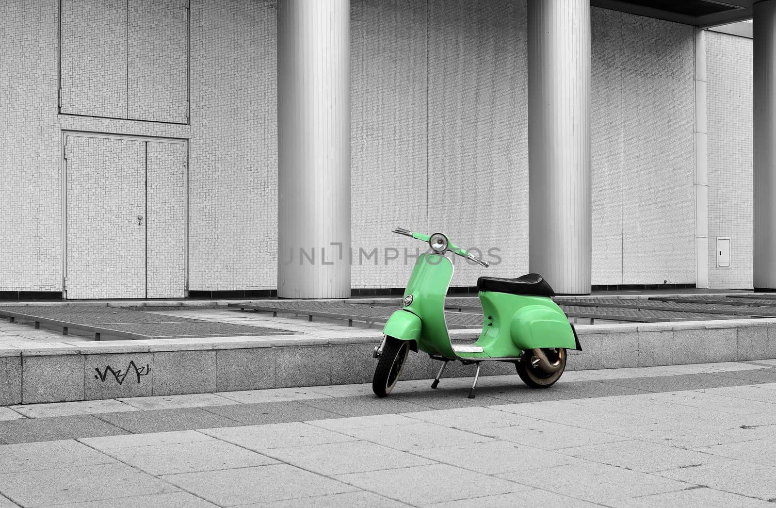 parked scooter on the roadside in the centre of Berlin