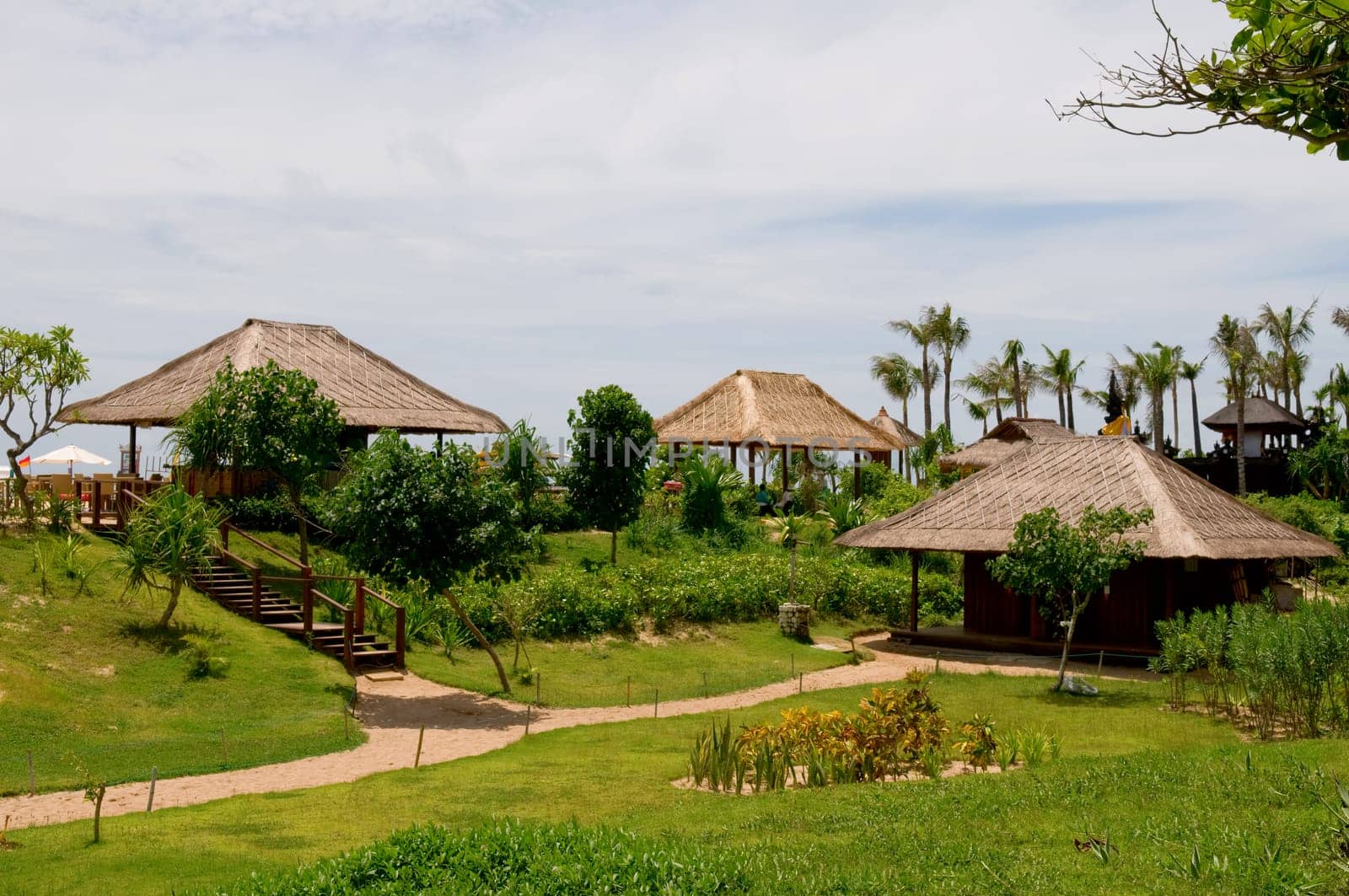 Huts in green field of India