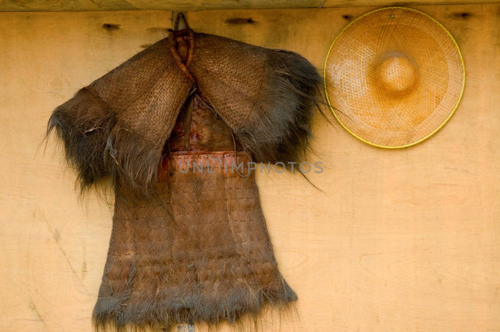 Traditional chinese farmer straw coat and bamboo hat