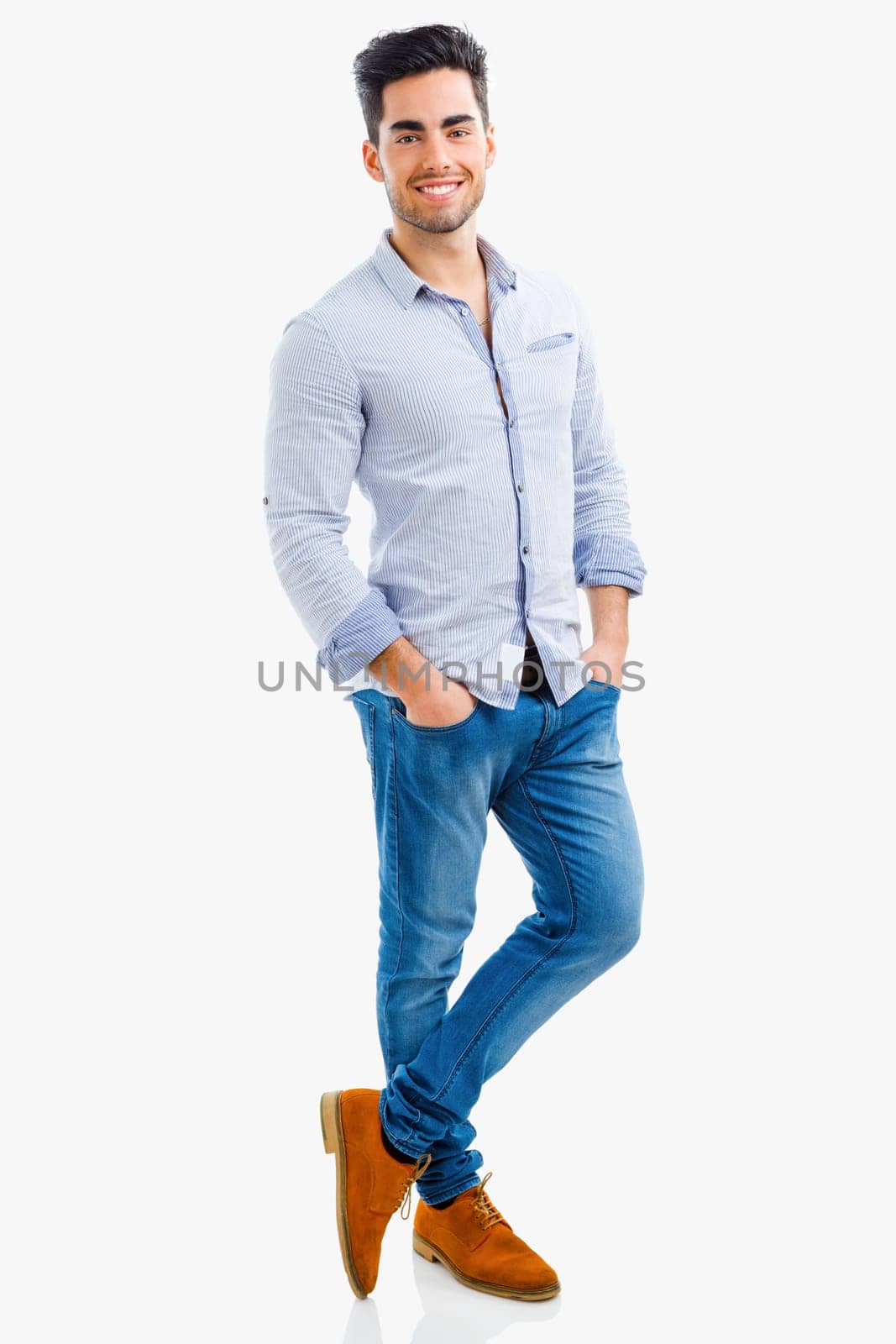 Portrait of happy handsome young man looking through his hands