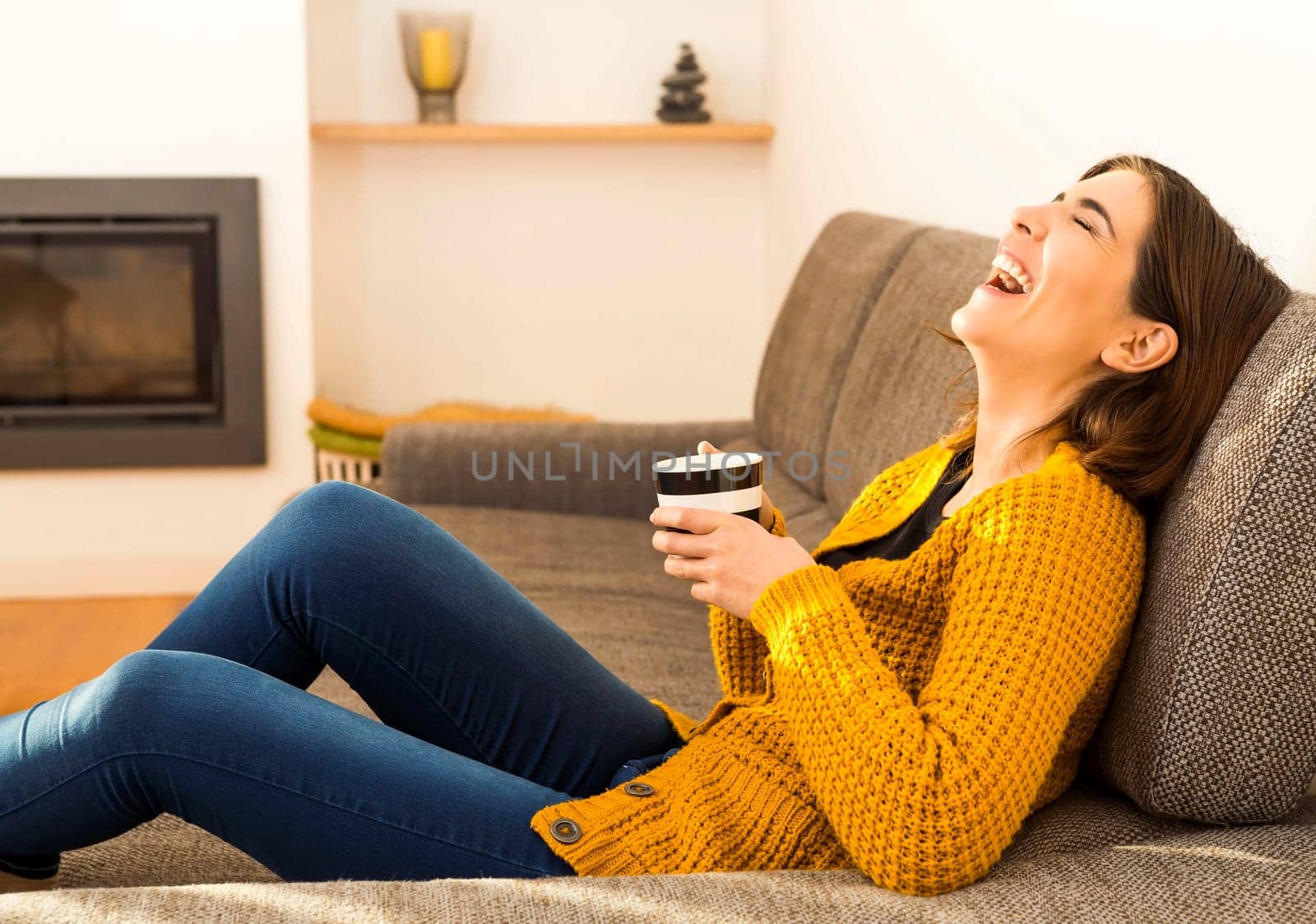 Beautiful woman at home Having a good time with cup a coffee