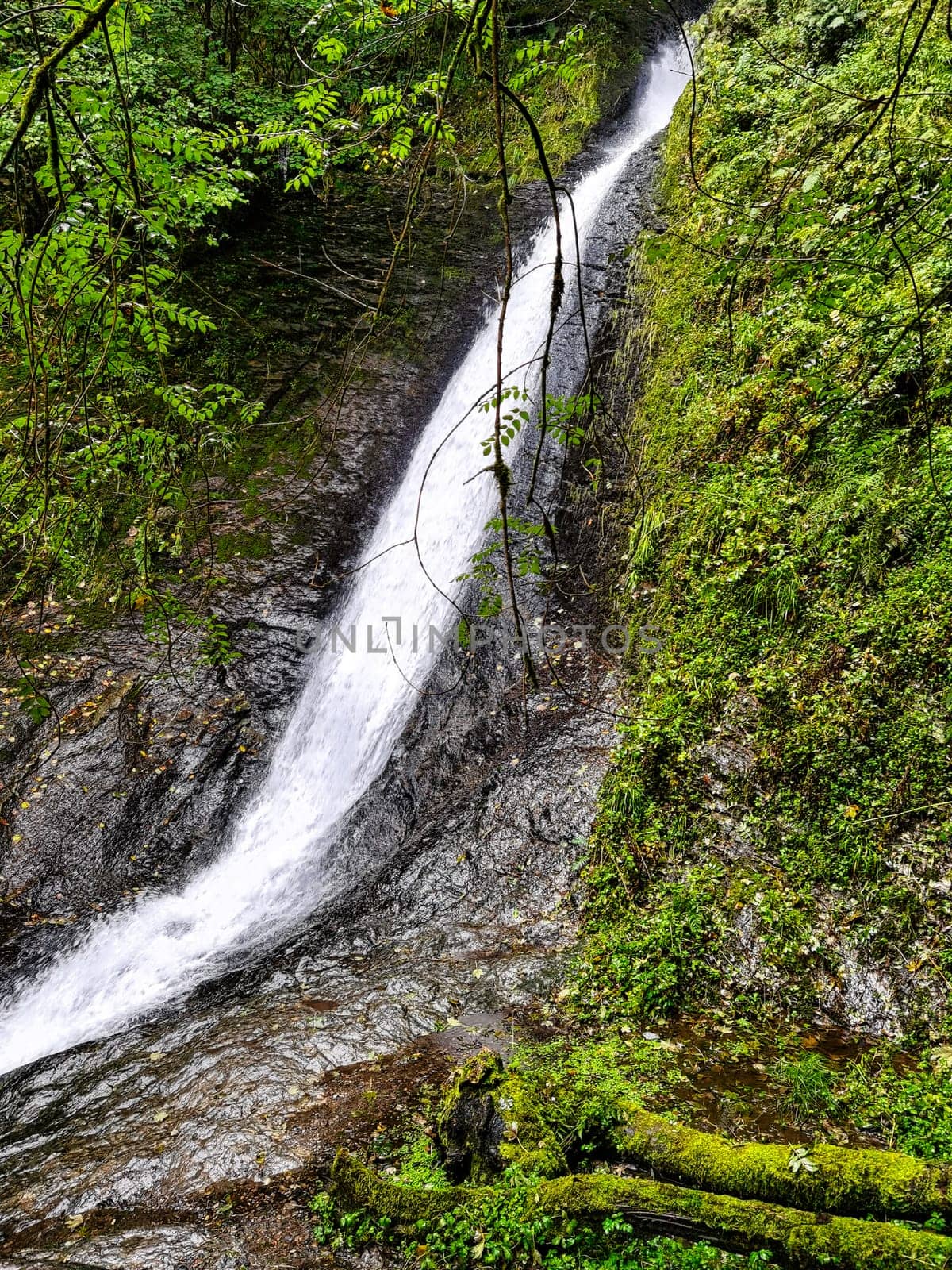 Whitelady waterfall in rain - Lydford Gorge, Dartmoor National Park, Devon, United Kingdom