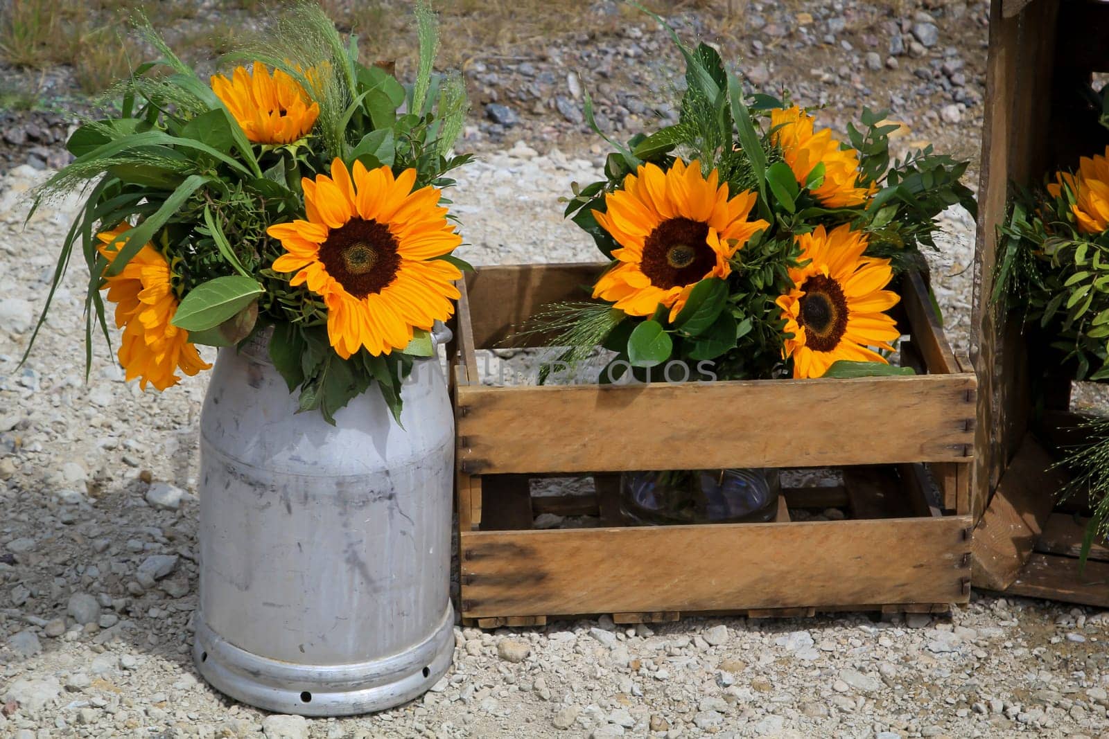 A festive decoration with beautiful yellow sunflowers.
