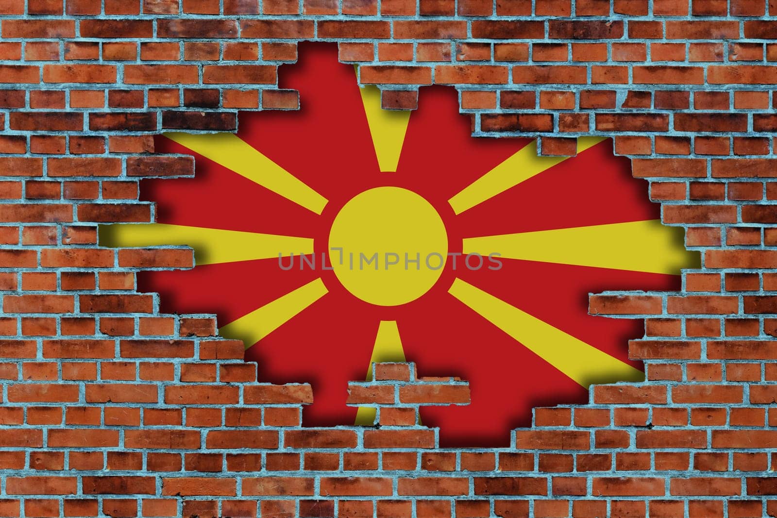 3D Flag of North Macedonia behind the broken old stone wall background.