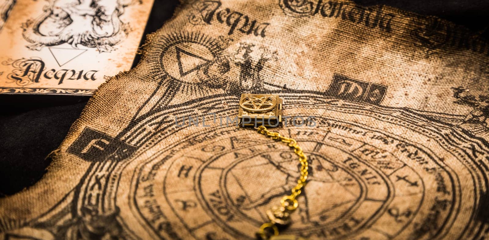 Ancient esoteric witchcraft background. Occultims and paganism old symbol, with mysterious runes and alphabet.
