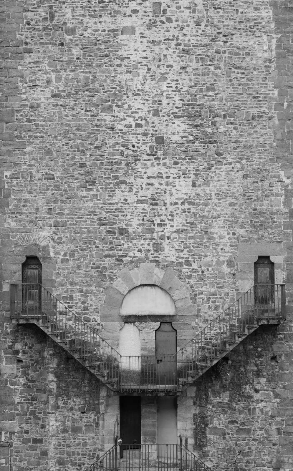 Exterior of antique building with Escher architecture style. Simmetry and geometric perspective.