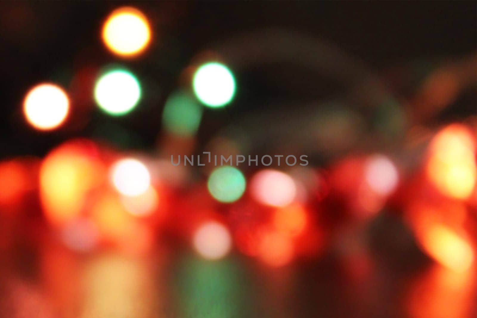 Christmas garland out of focus. Universal holiday background. Concept of christmas, new year. Blurred background, out of focus.