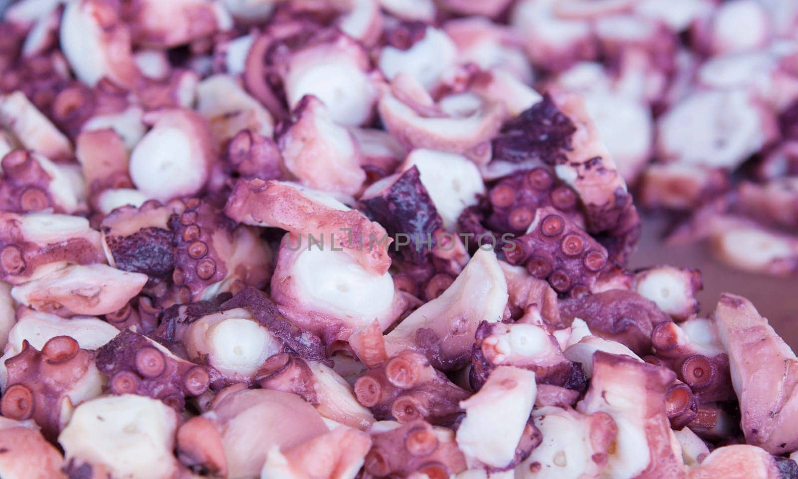 Boiled and chilled sliced of octopus. Galician-Style tapa