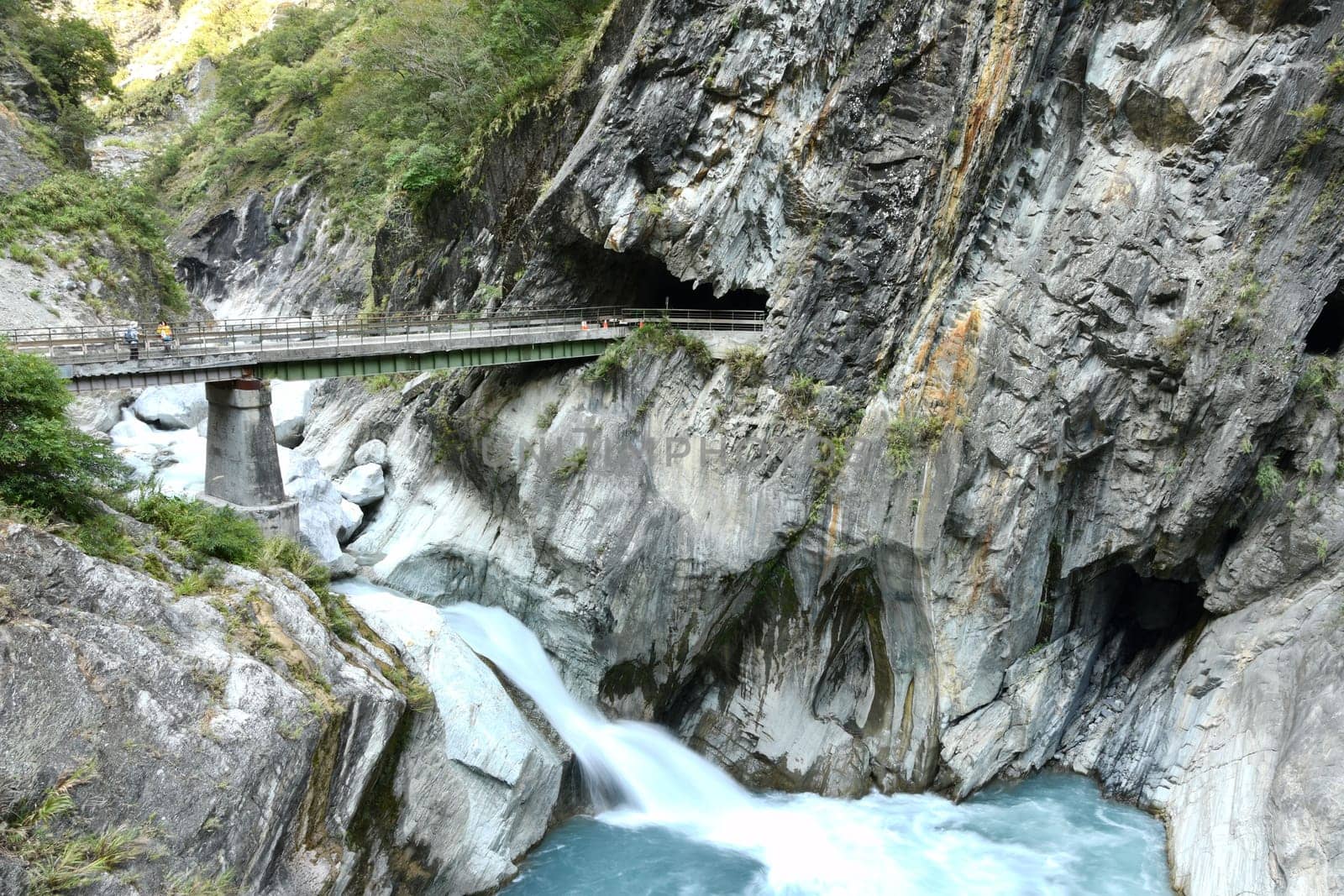 Beautiful view of the Ice blue river and the bridge over it in Tianxiang, Hualien, Taiwan