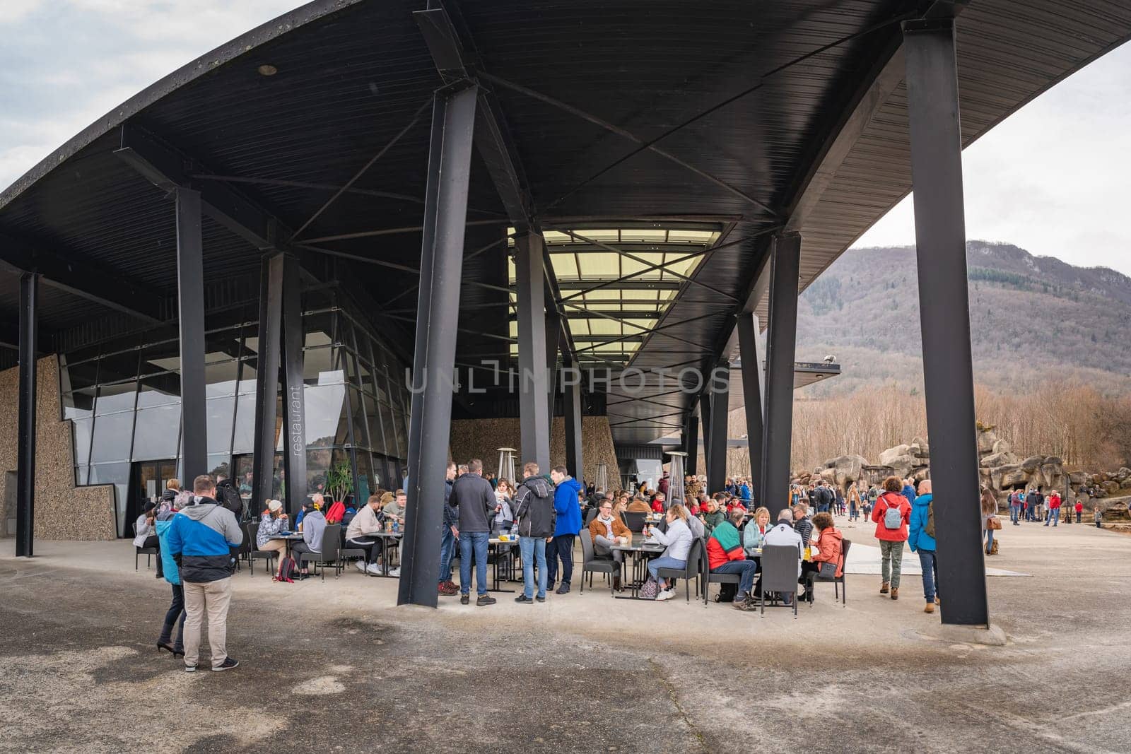 Tarascon sur Ariege, France, Jan 2020 People dining in a restaurant, resting before hitting the road to reach their destination in Pyrenees mountains