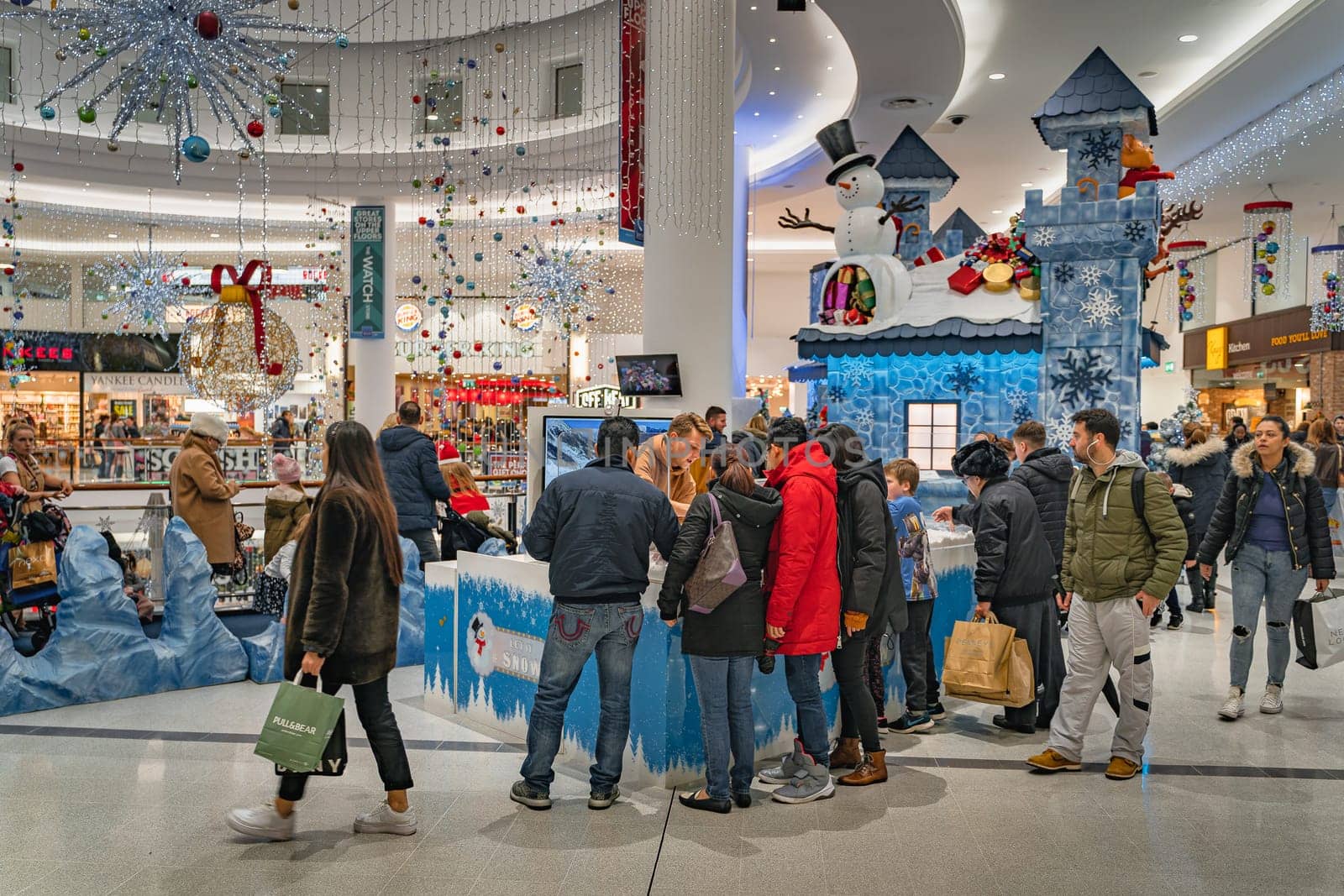 Dublin, November 2019 People, families queuing to visit Santa Claus grotto or castle in Jervis Shopping Centre