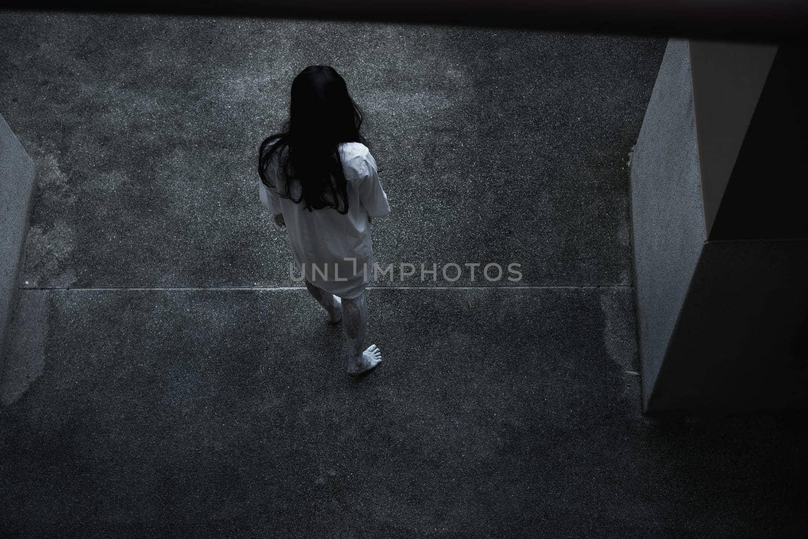 Back woman ghost horror under building house, halloween concept