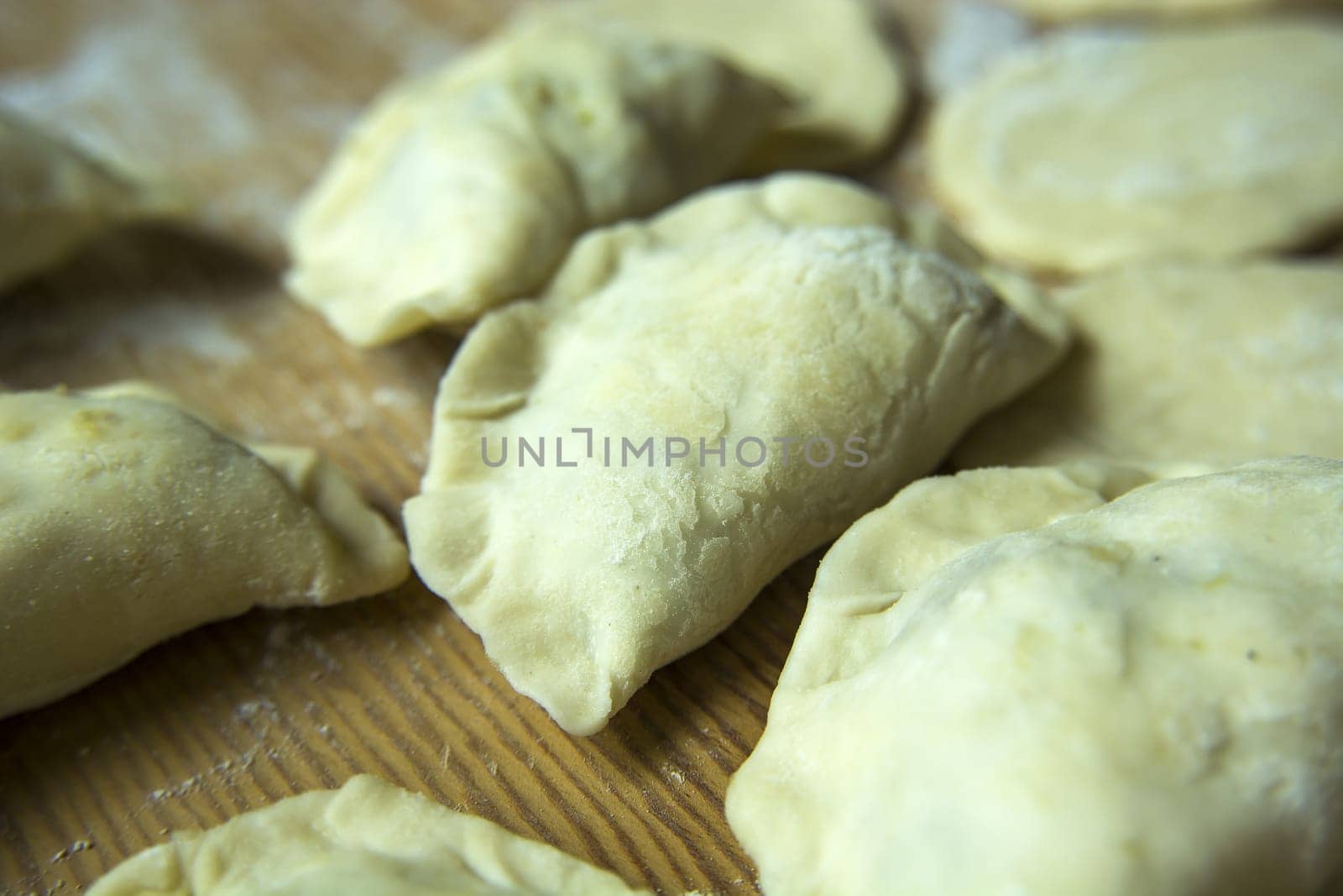 Delicious homemade Polish dumplings ready for cooking, close up