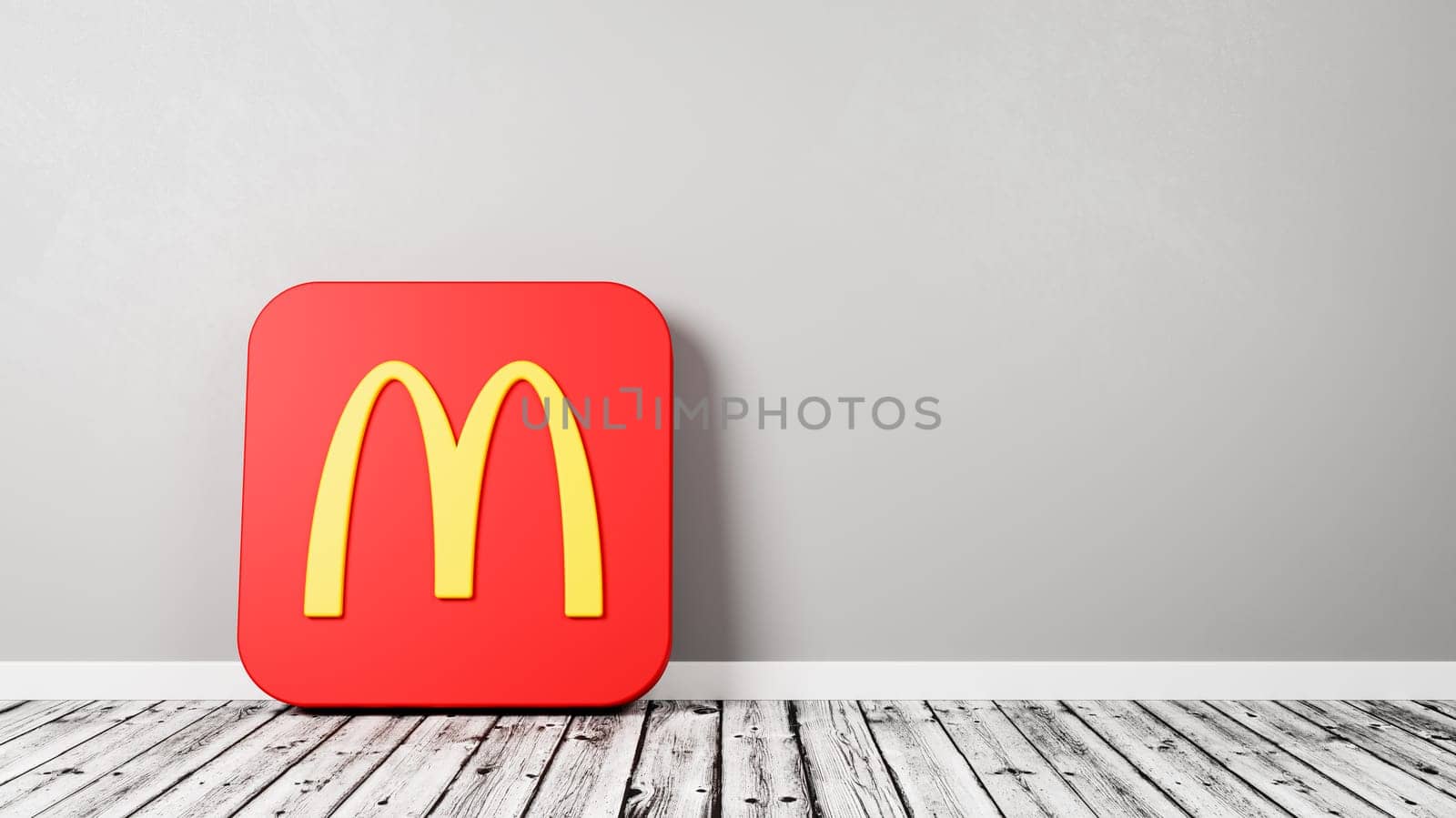Mcdonalds Logo 3D Symbol Shape on Wooden Floor Against Gray Wall with Copy Space 3D Render Illustration